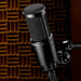 Audio-Technica AT2020 condenser microphone right side view in studio background